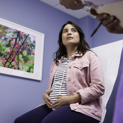 A pregnant woman in a doctor's office